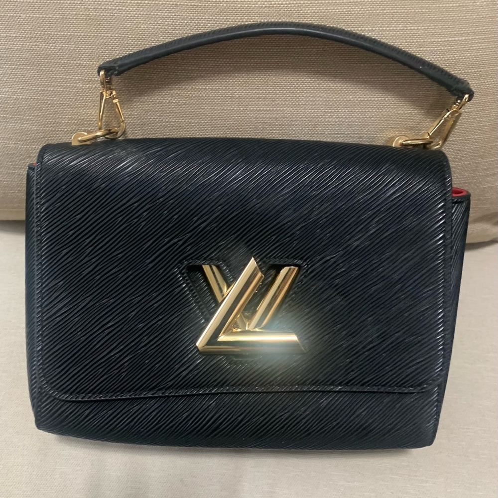 Louis Vuitton Black and Gold Mini Bag with Structured Design